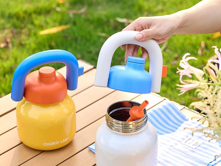 Hung Kettle bottles on a picnic table outdoors